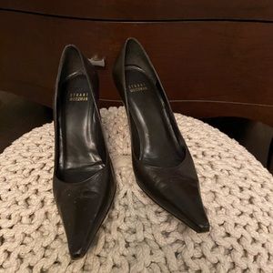 Stuart Weitzman brown leather pumps.